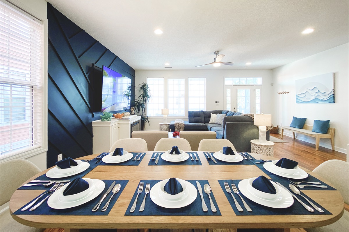 [Dining Area] Come together around our expansive 8-seater dining table in the heart of our open-concept floor plan. Create cherished memories over laughter, stories, and delectable meals in a space crafted for unforgettable moments shared.