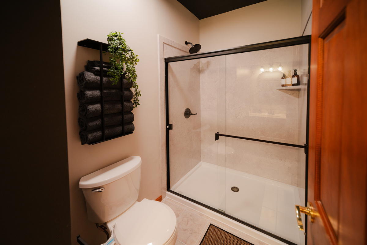 Easy-access full bath serving Bedroom 2 and the main living areas.