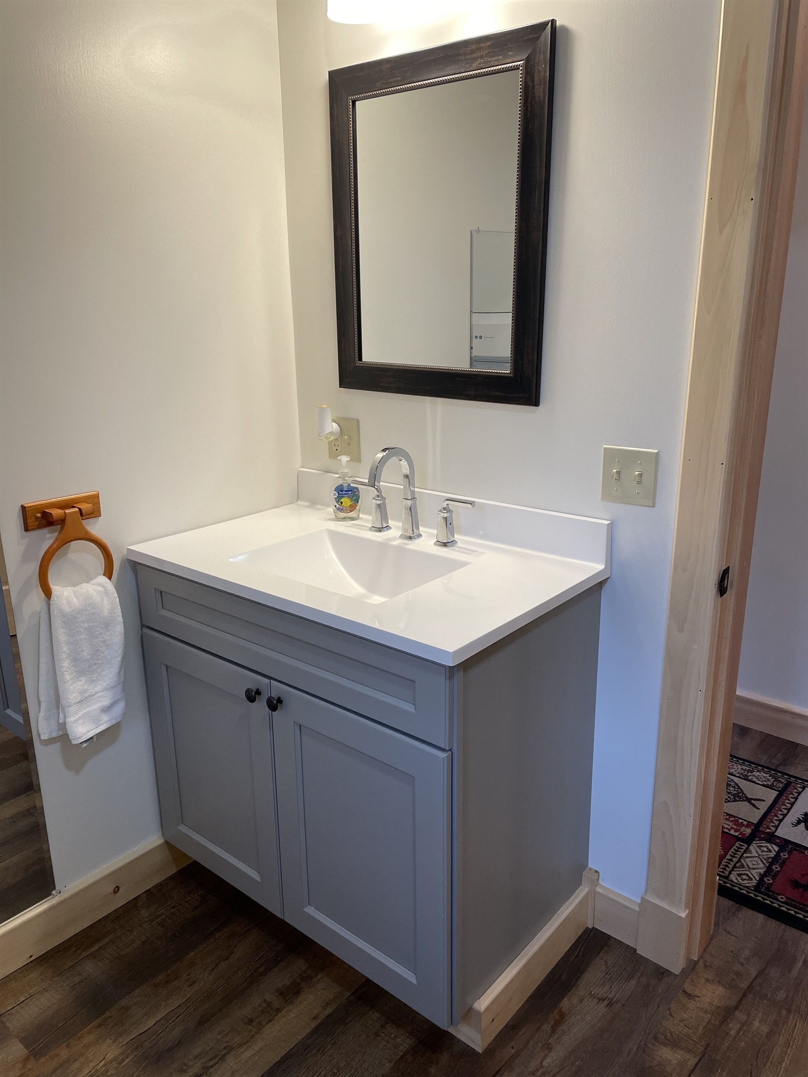 Full bathroom with washer and dryer
