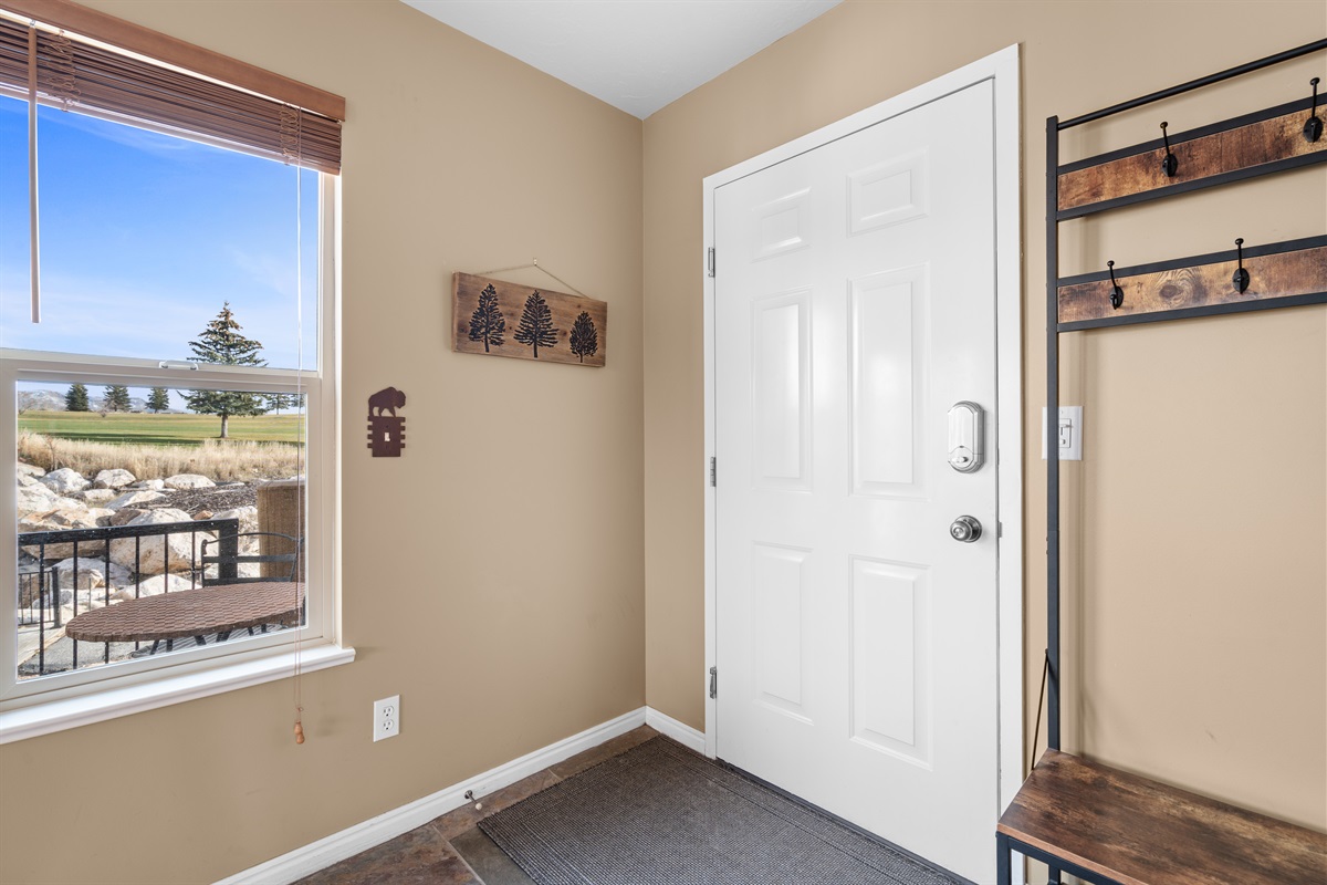 Step inside to a warm and welcoming entryway that sets the tone for your mountain getaway.