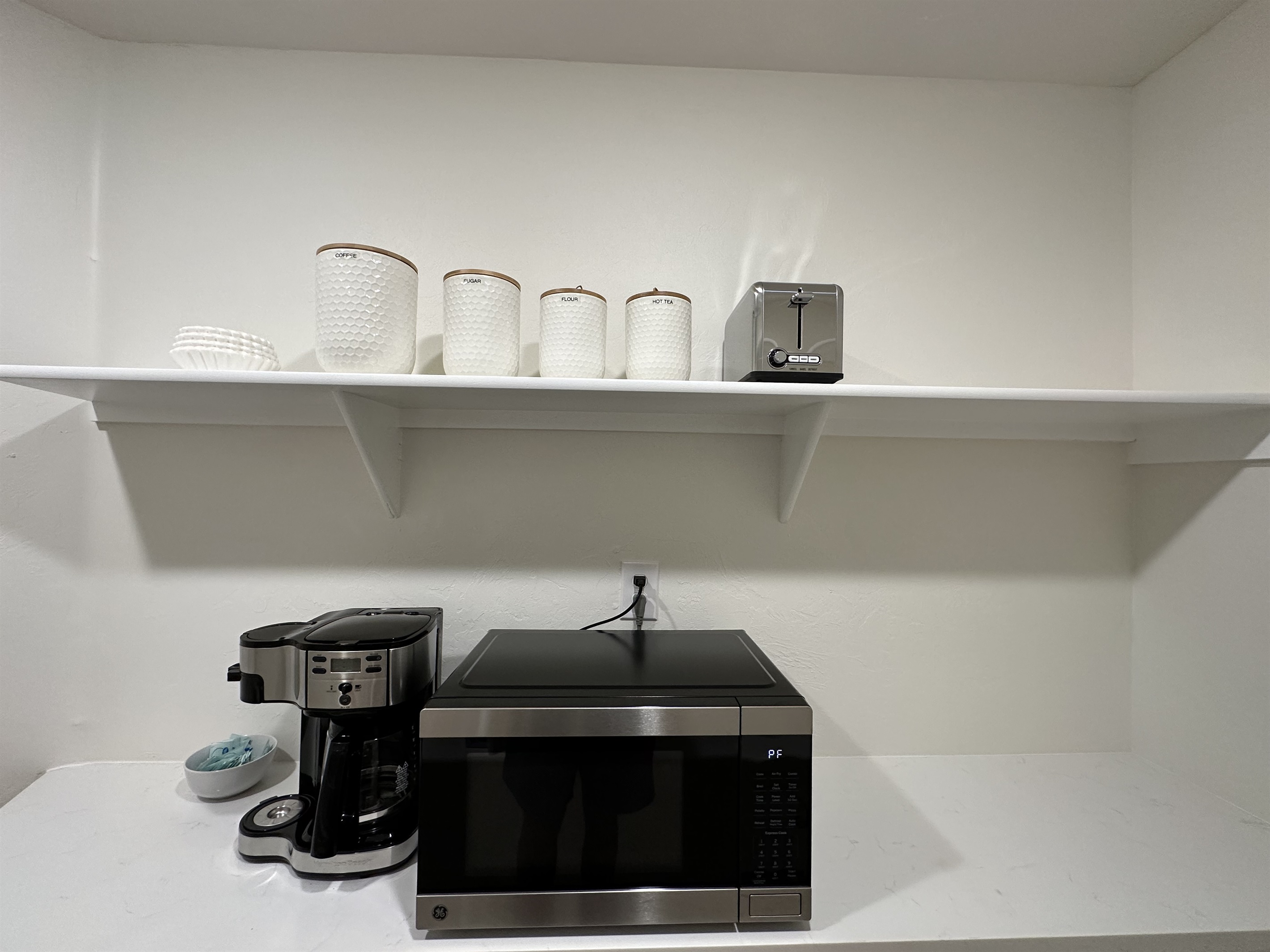 Pantry with microwave and coffee maker