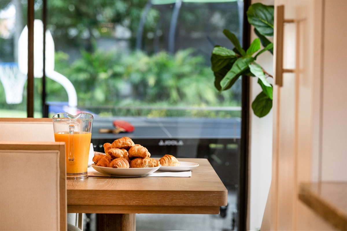 Enjoy meals together at a stylish table that seats six.