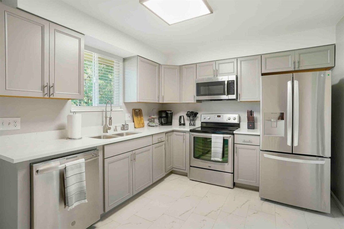 Beautifully remodeled kitchen, fully stocked with all your cooking needs.