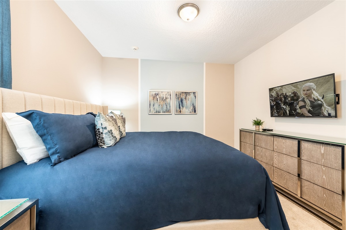 Escape to this spacious king-size bedroom, offering ultimate comfort and style
