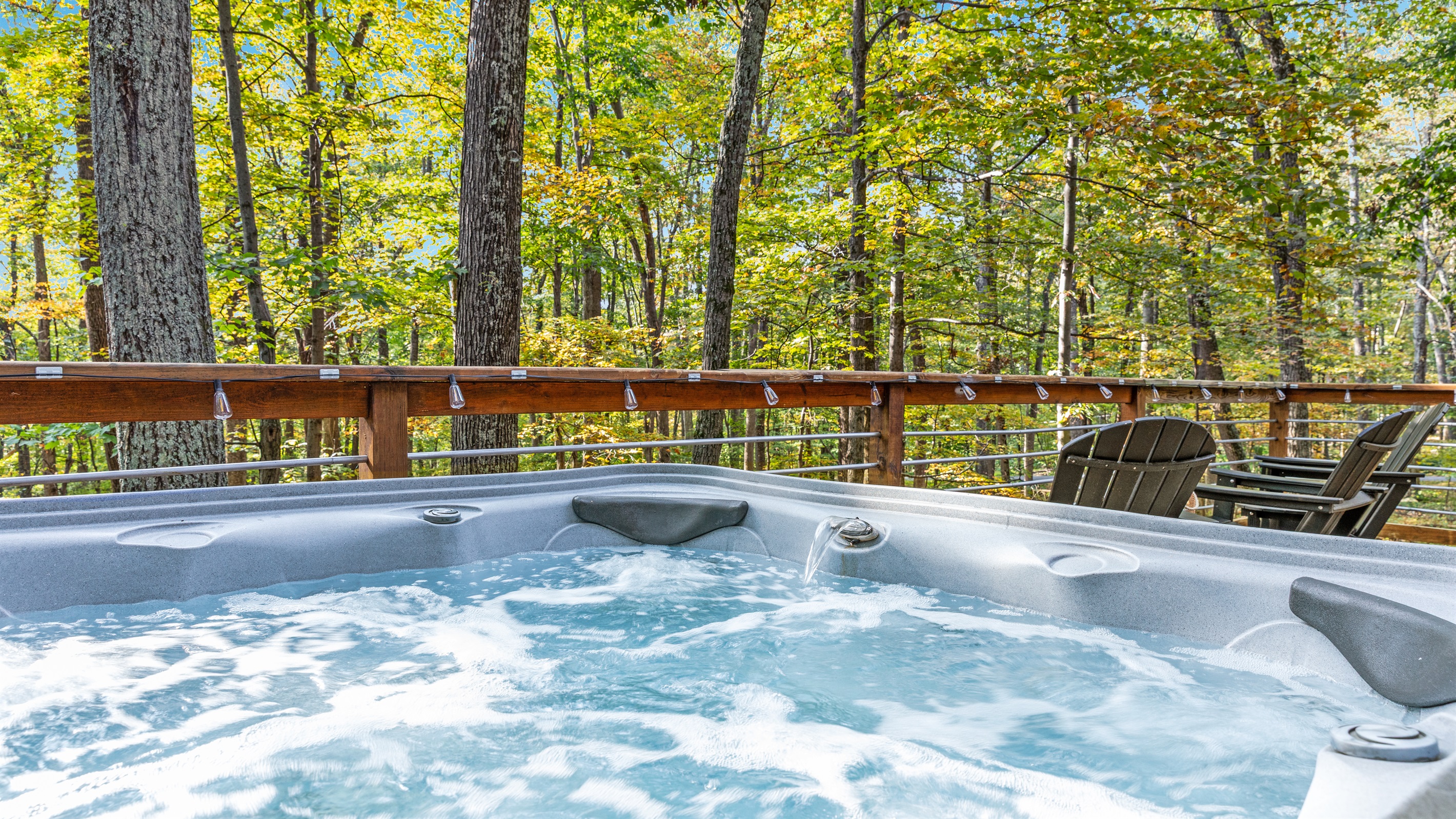Whether soaking in the hot tub or lounging in the Adirondack chairs, you’ll love the peaceful forest setting