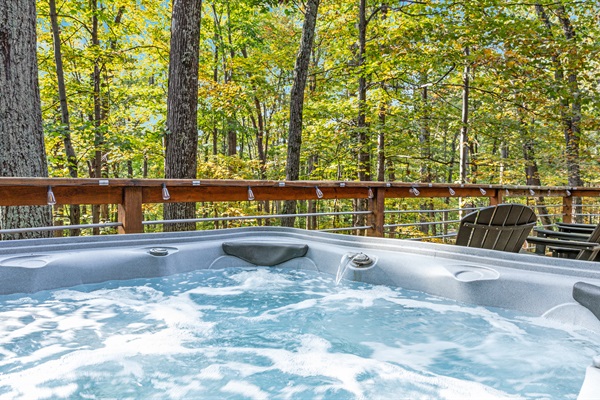 Whether soaking in the hot tub or lounging in the Adirondack chairs, you’ll love the peaceful forest setting
