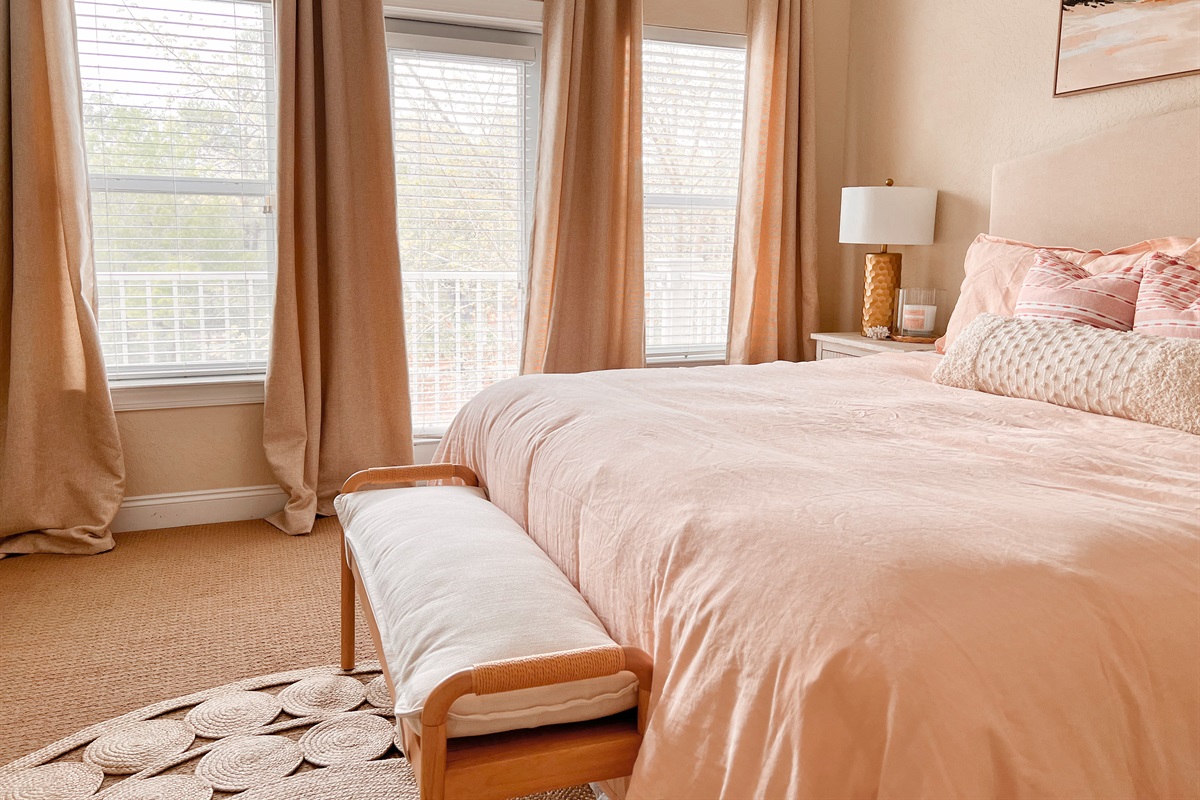 Guest Room 1 (King bed with ensuite bath, french doors + balcony, tv)