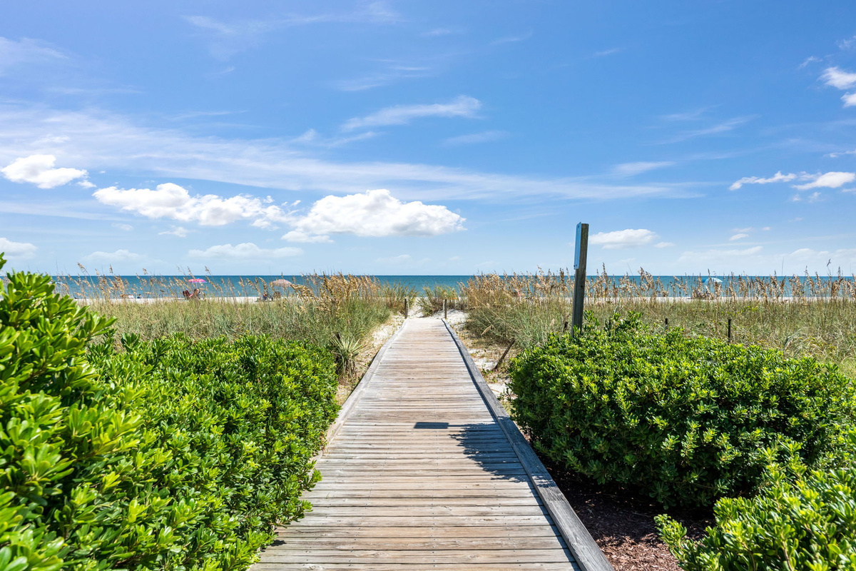 Boardwalk beach access through the dunes