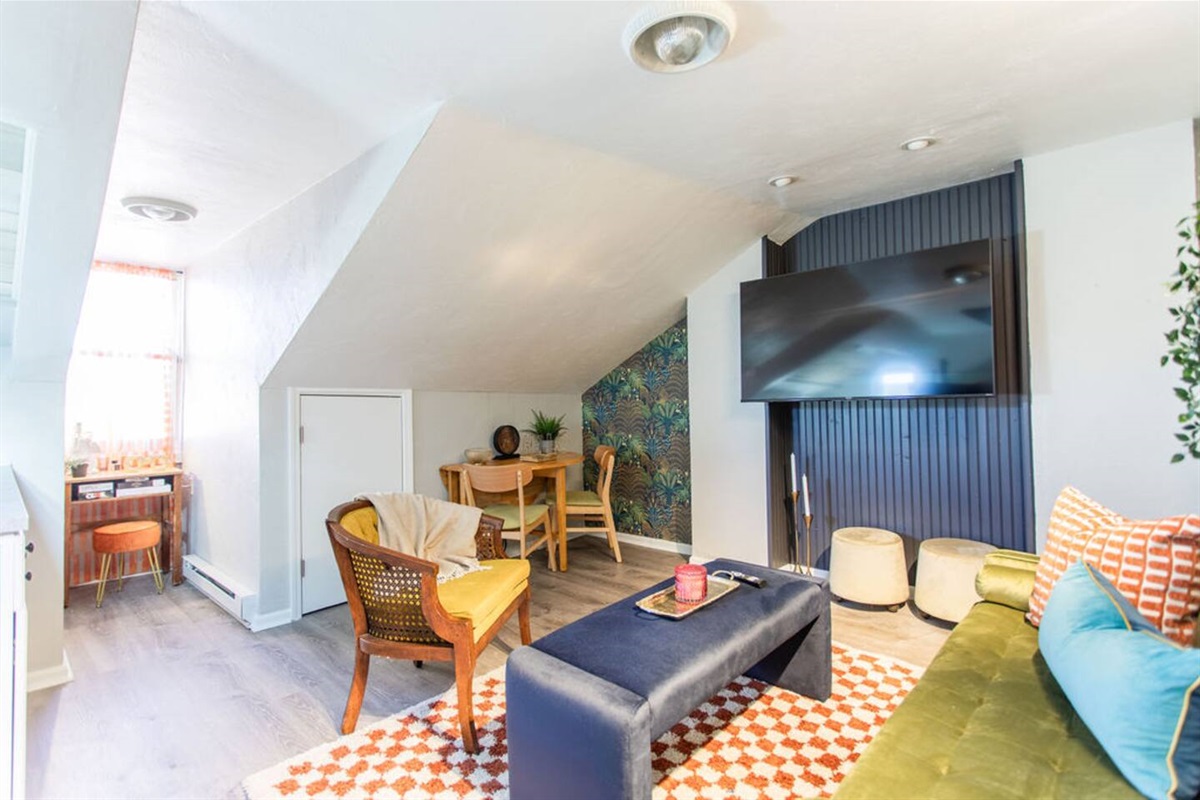 Spacious living area with a welcoming ambiance, perfect for relaxation and comfort.