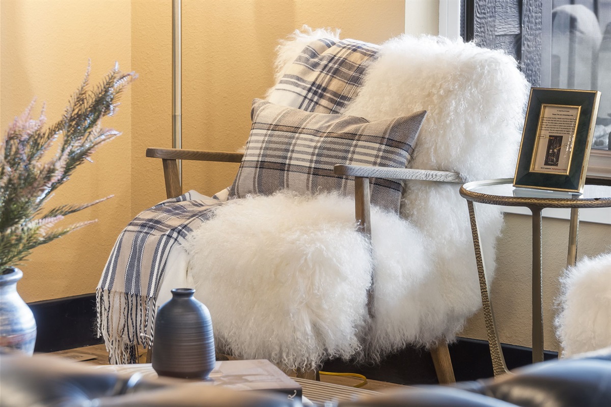 Cozy chairs and couches throughout