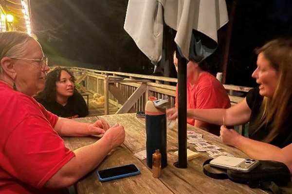 Tough game of spades on the upstairs deck!