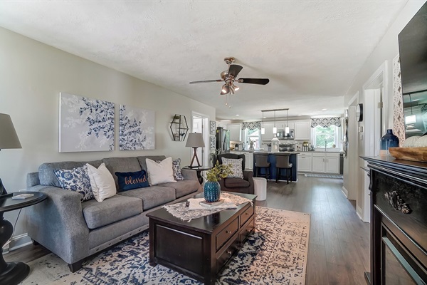Sink into the comfy couch and snuggle up to the electric fireplace to watch your favorite movie.