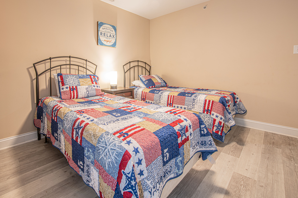 Bedroom 5 with Two Twin Beds, Nautical Quilts