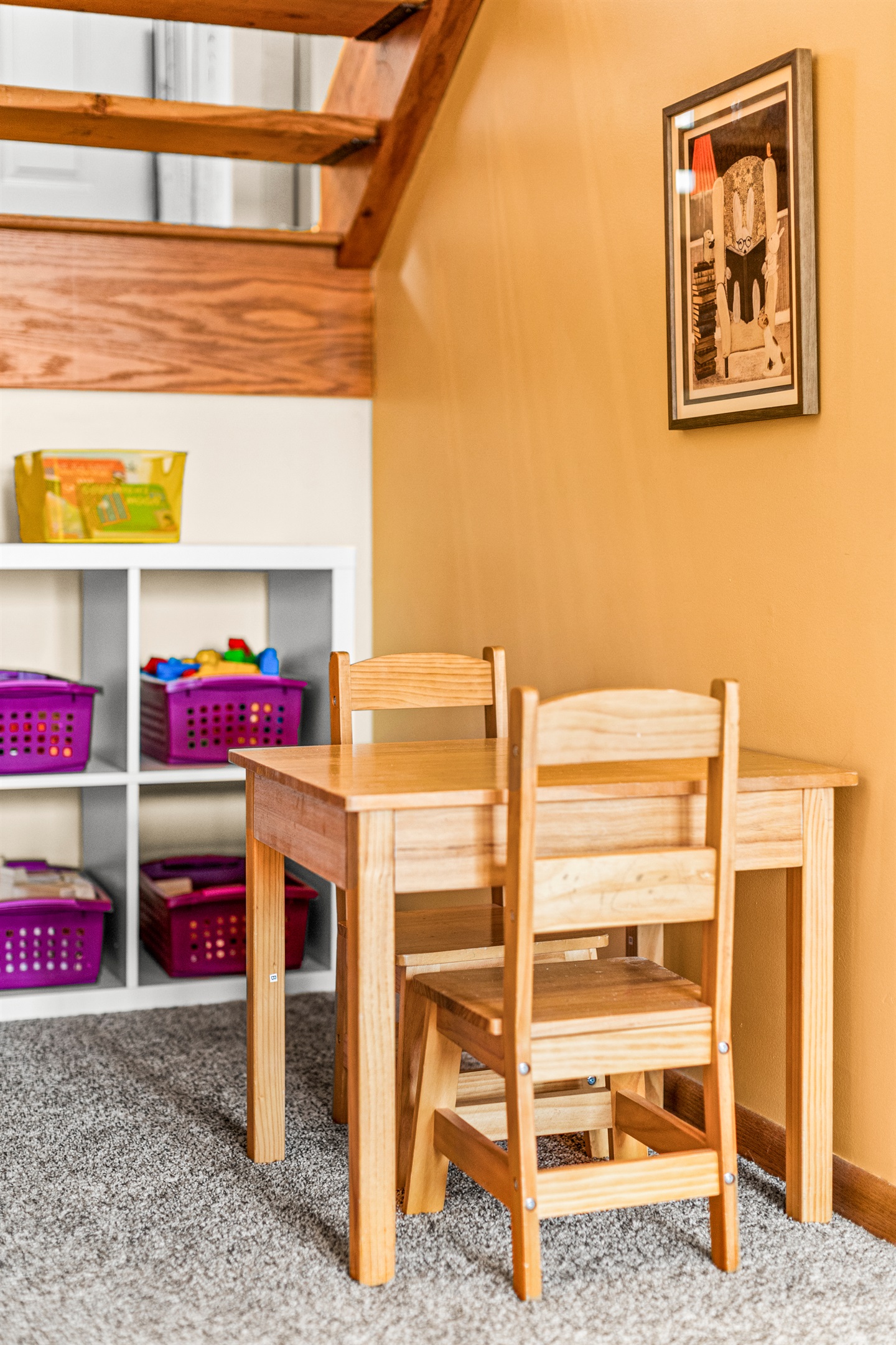 A charming nook with a kids' play area, creating a perfect space for little ones to play while adults relax.