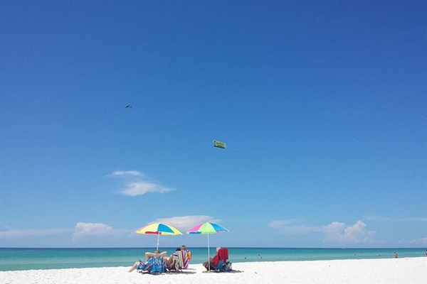 This COULD be you sitting in our white sandy beahes