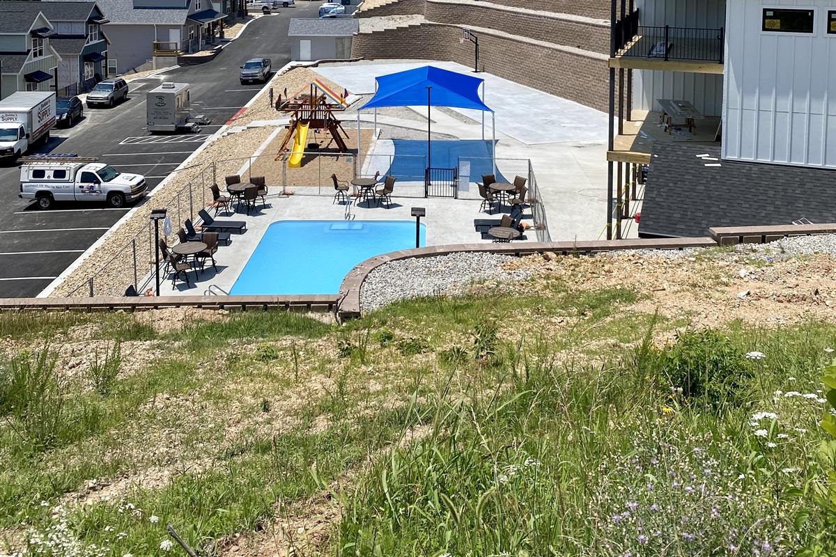 Outdoor pool #2 completed! You can see the home up on the hill in the background.