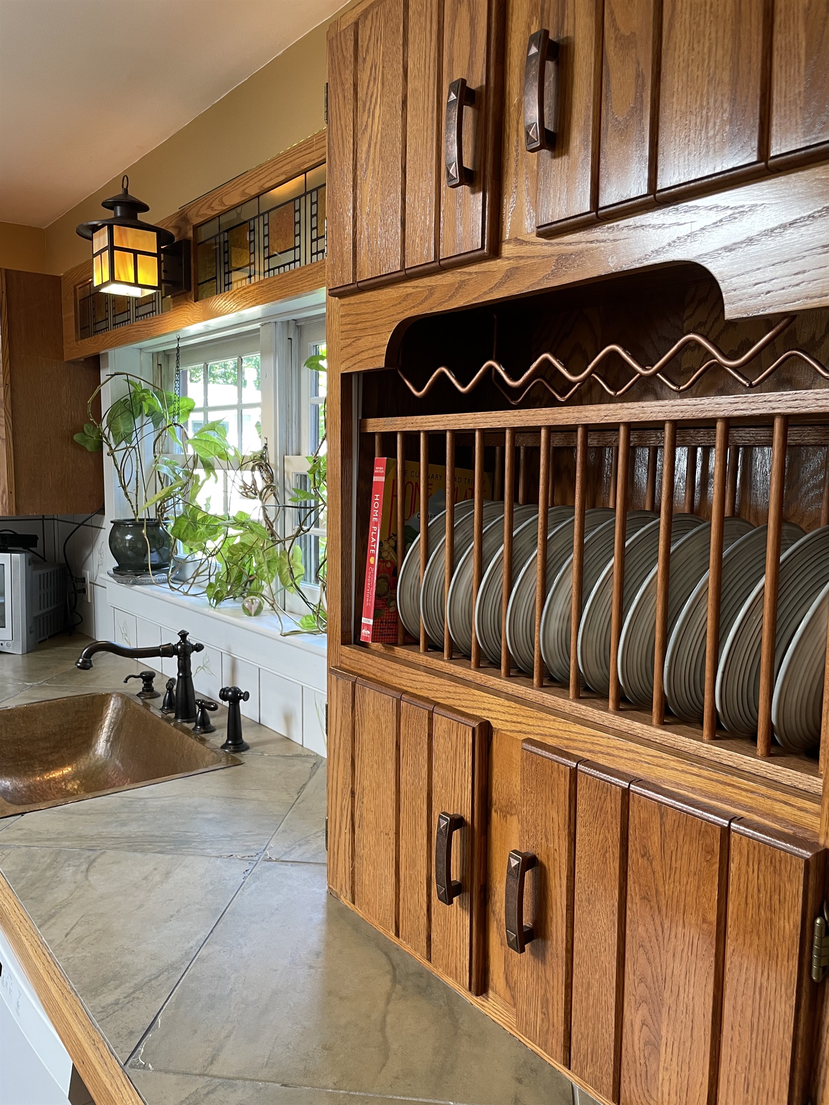 Delightful art & crafts touches of style throughout.