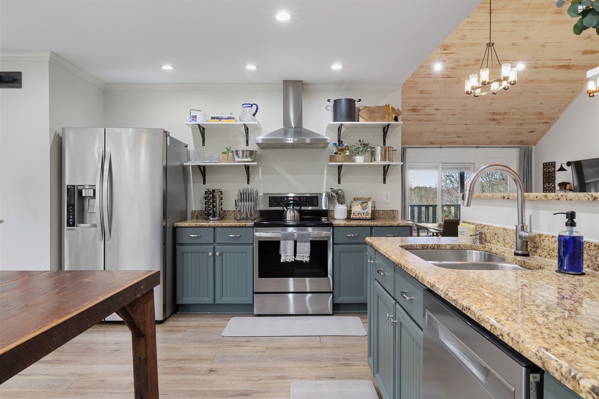 Stainless steel appliances in kitchen.