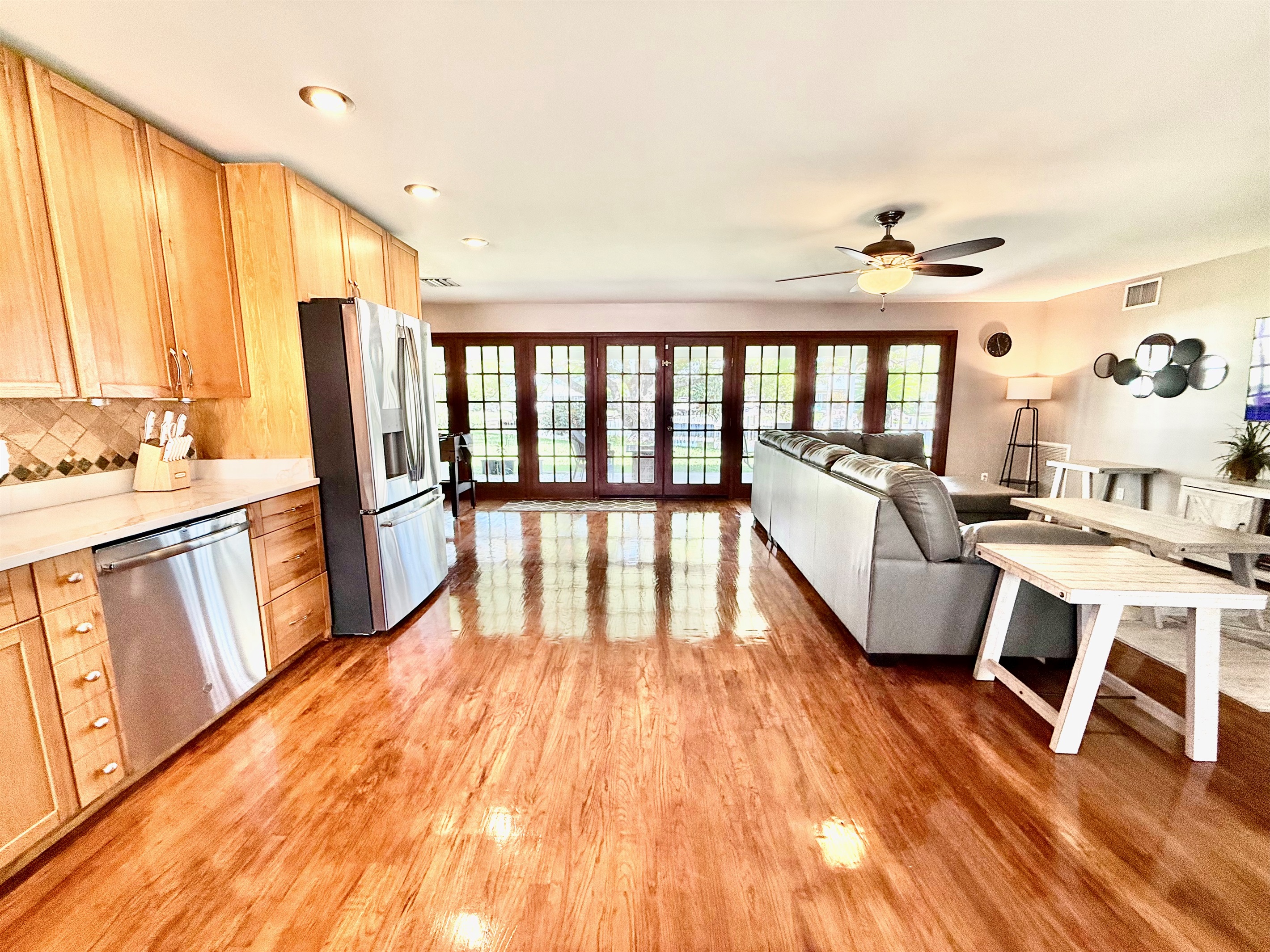 Prepare your favorite meals in this airy kitchen with stainless steel appliances, loads of counter space, and plenty of natural light to start your mornings right.