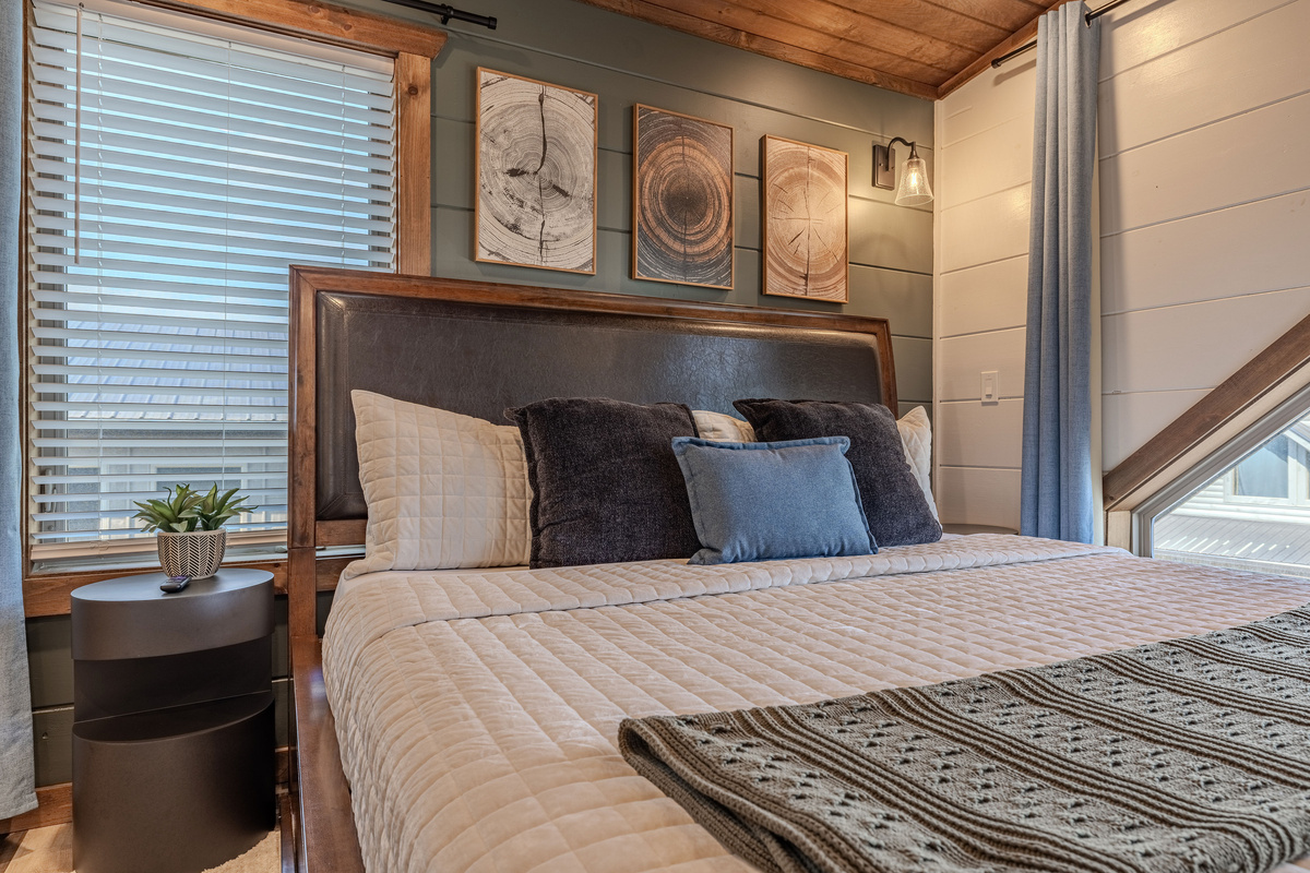 Another view of the upstairs king bedroom and its natural light.