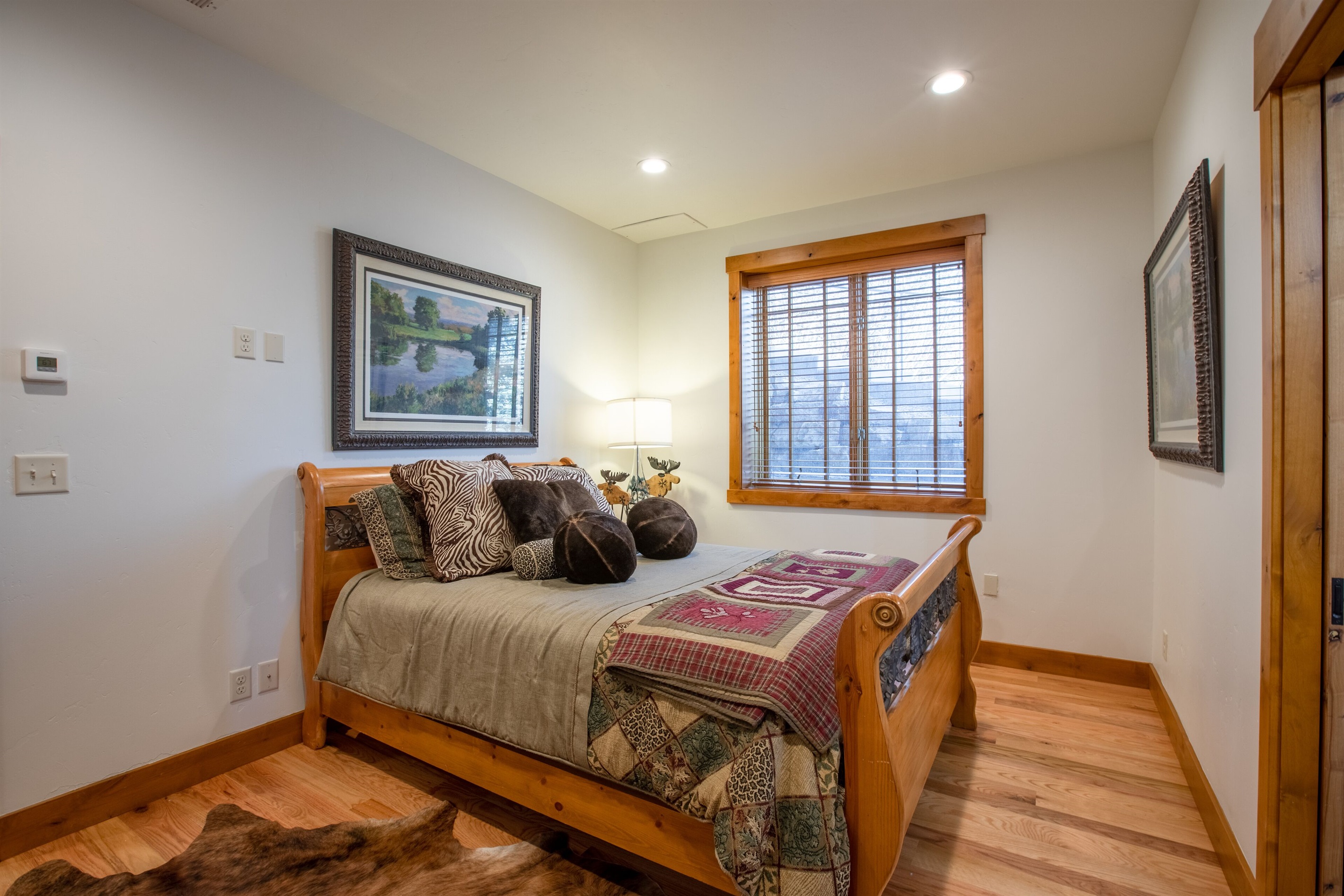 Queen bedroom with shared bathroom to bunk room
