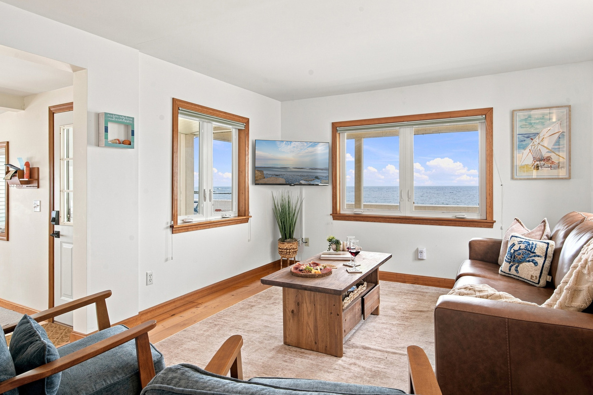 Bright and inviting living space with comfortable seating and natural light.