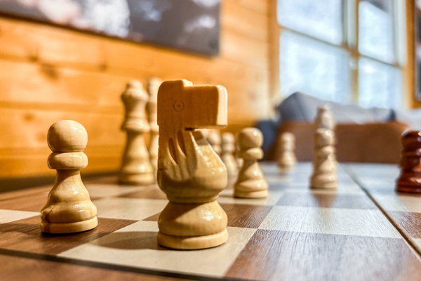 Our beautifully carved chess set is yours to play. Checkmate!