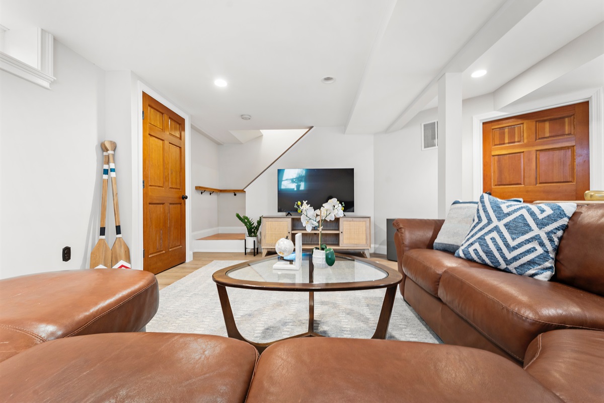 Gather, unwind, and enjoy your favorite shows in the spacious living room.