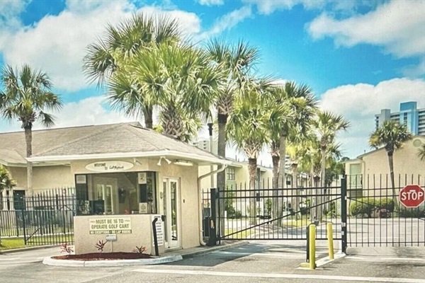 Gulf Highlands main entry gate with 24/7 security
