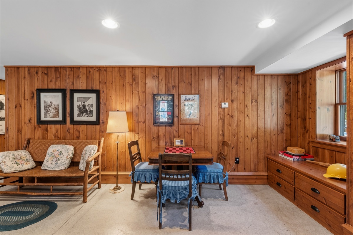 Lower level game area w/ pool table & space to relax or play