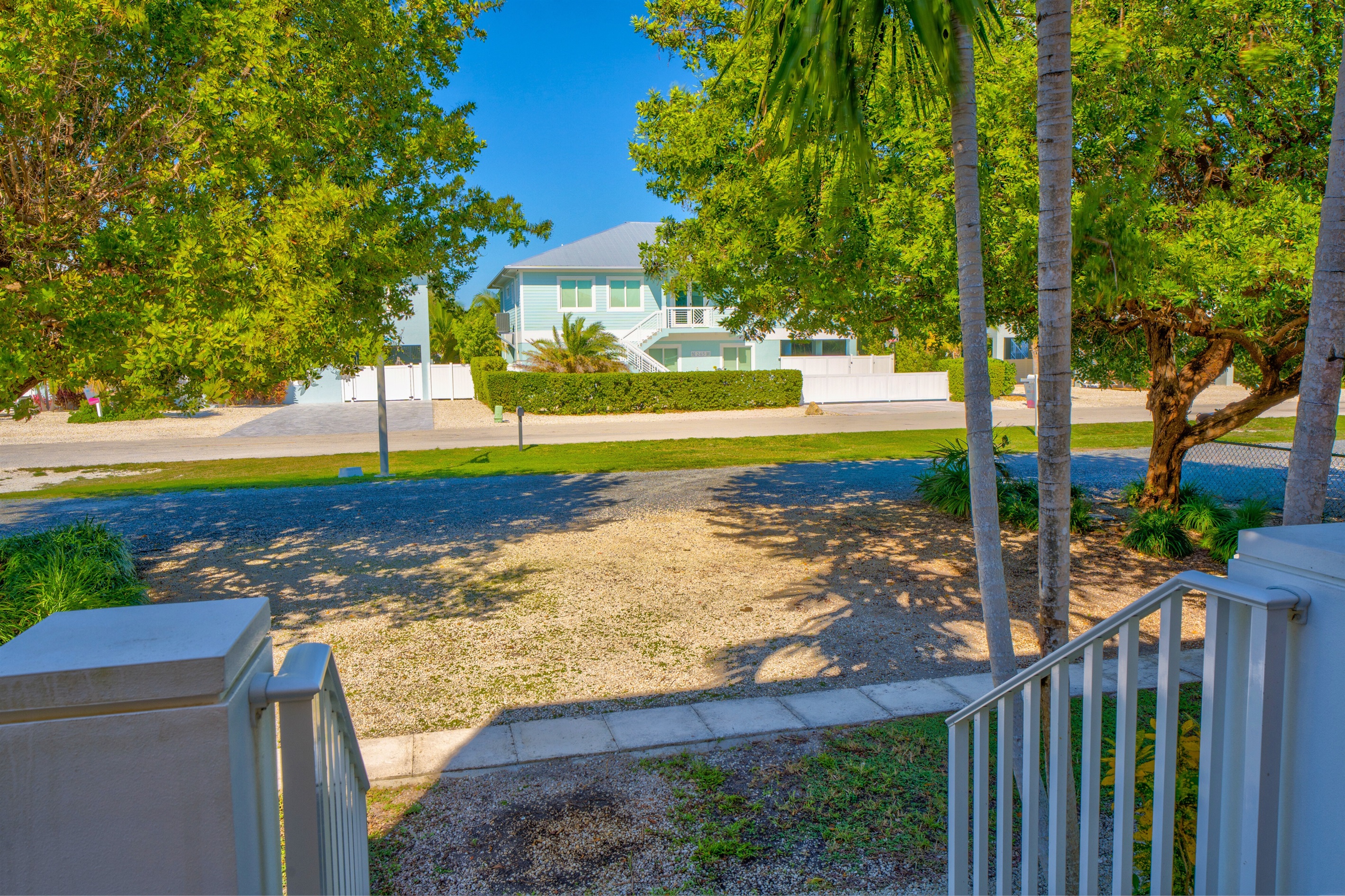 Plenty of parking in front for three vehicles and a boat trailer, or four vehicles.