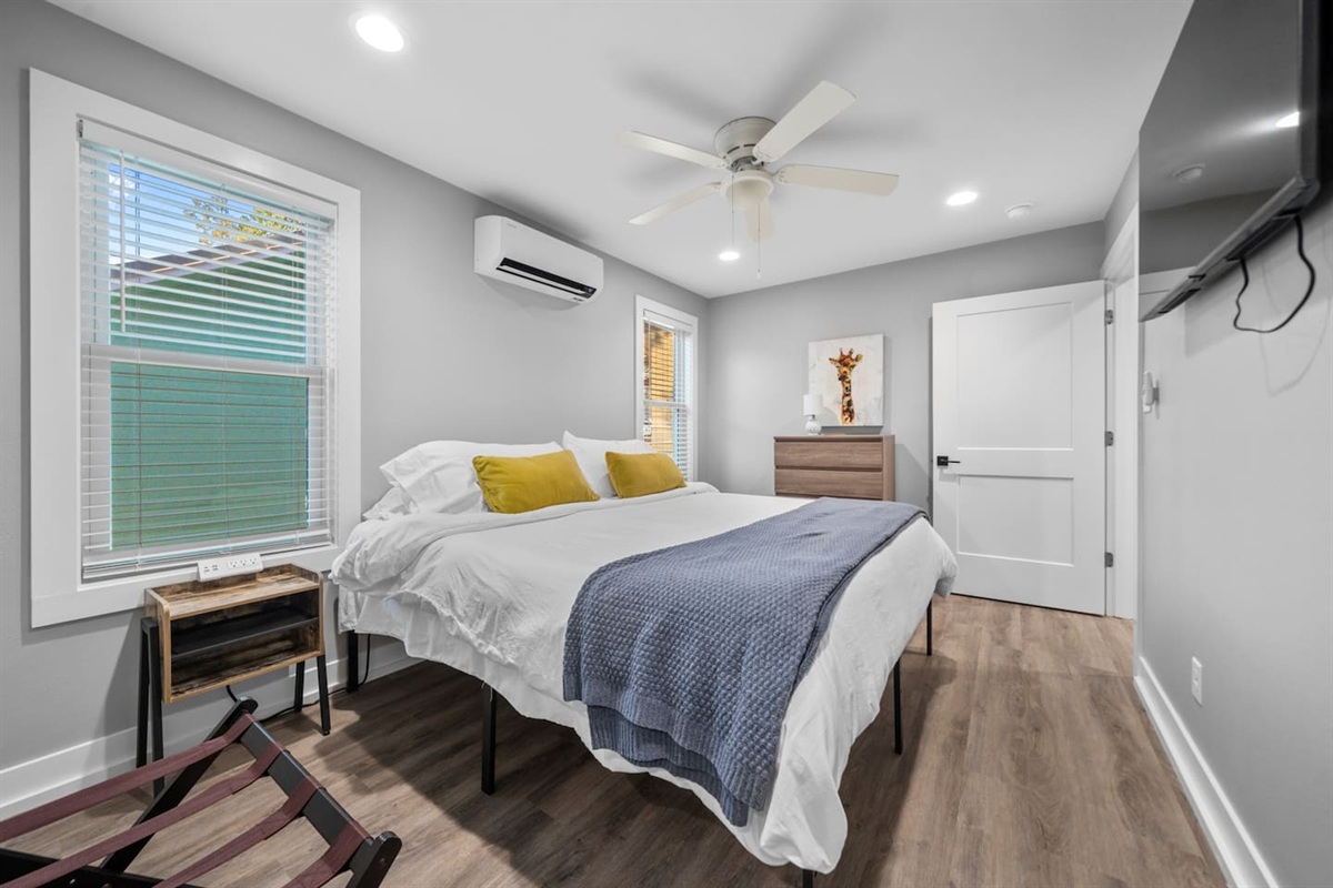 The Primary Ensuite features a King Bed, Bedside Tables, a Smart TV and Mini Split for maximum Climate Control.
