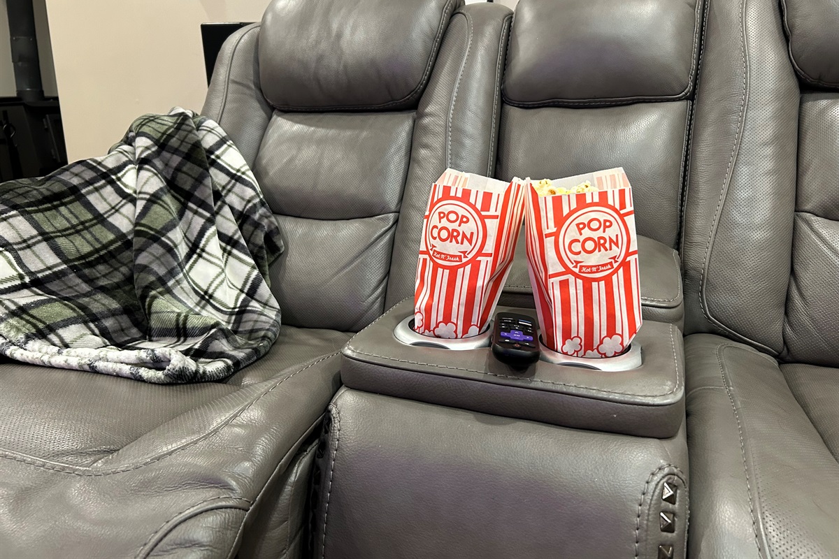 Enjoy some movie theatre style popcorn while relaxing in the recliners and watching a movie with surround sound.