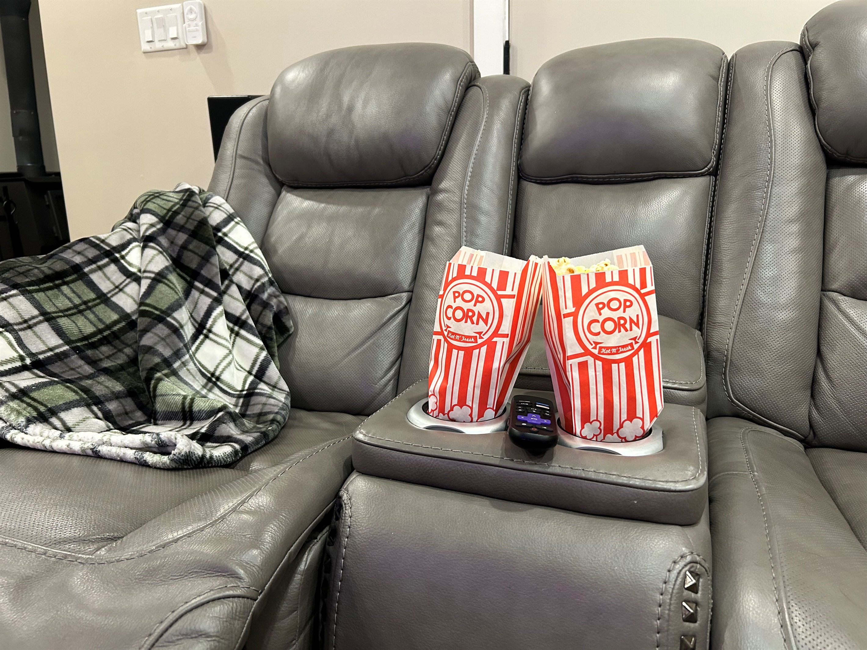 Enjoy some movie theatre style popcorn while relaxing in the recliners and watching a movie with surround sound.