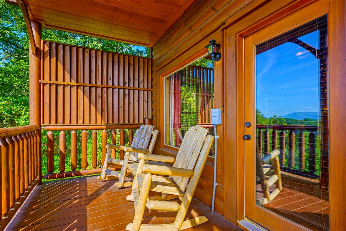 Rocking chairs on the porch.