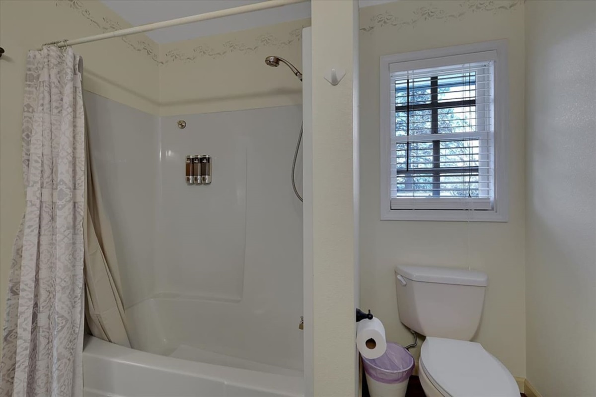 Full Bathroom 3 with vanity storage, a large mirror, and easy access from the nearby common area.
