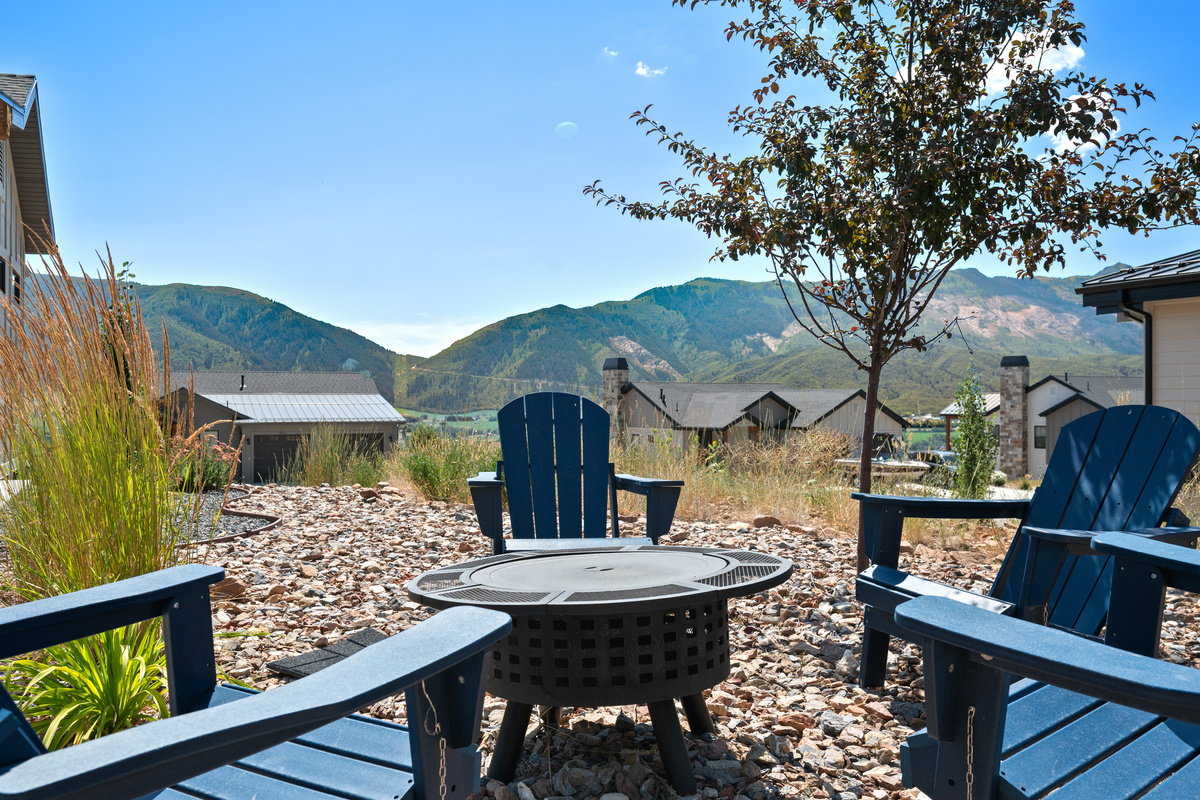 Gather around the outdoor fire pit in Adirondack chairs and enjoy mountain sunsets, fresh air, and unforgettable evenings under the stars.