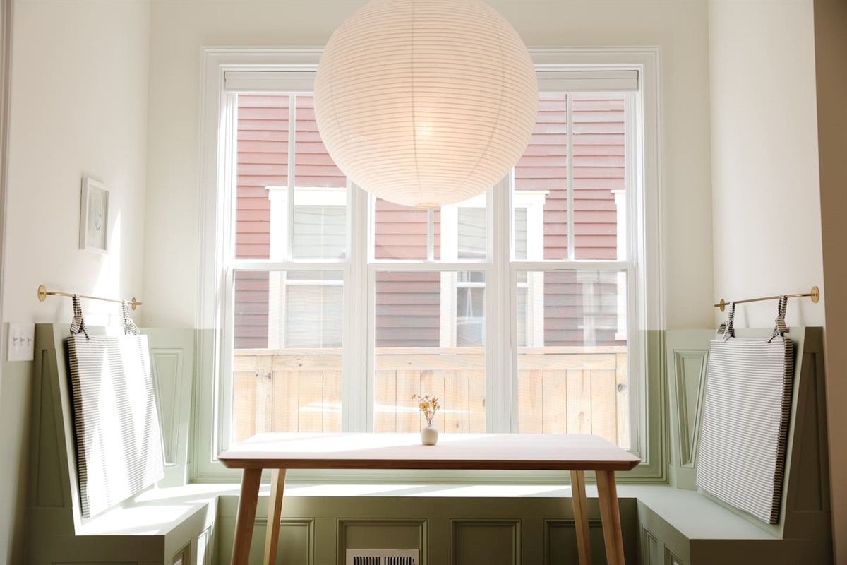 The breakfast nook may be our favorite part of the house. Featuring custom cushions and the oversized rice paper lantern from Hay. It's a great place to share a coffee or take a meeting.