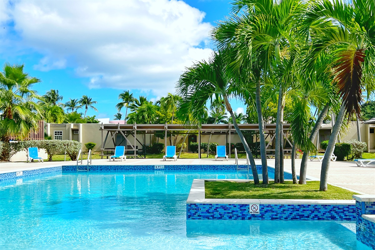 Take a refreshing dip, then unwind on a lounge chair with your favorite book.