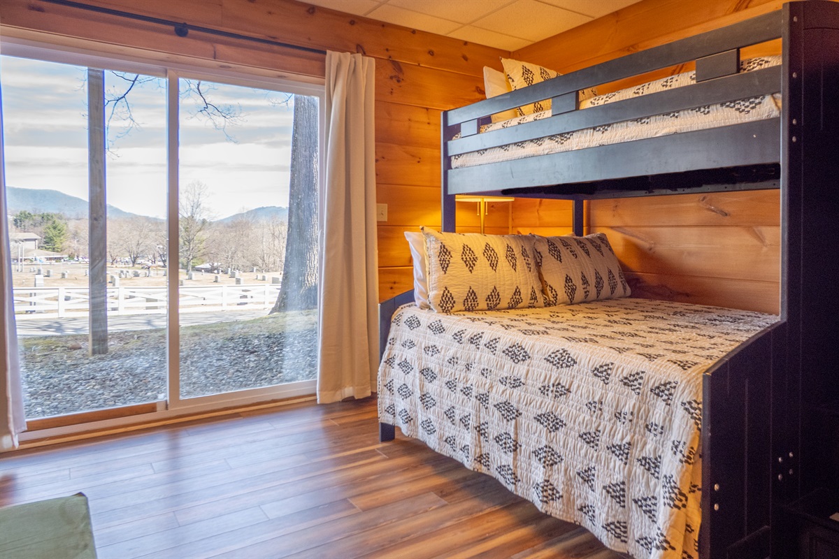 The Sapphire Owl's lower-level bunkroom features twin-over-full bunks, ideal for kids or extra guests.