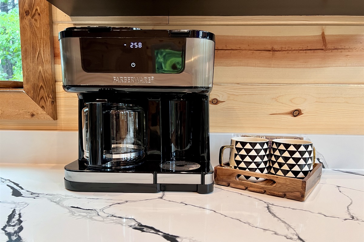 K-cup and drip coffee maker.  Starter K-Cups provided.