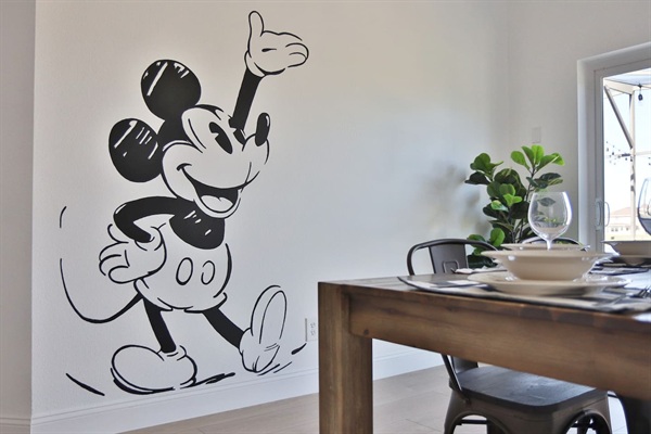 Custom Mickey Mouse mural, perfect for capturing memories with