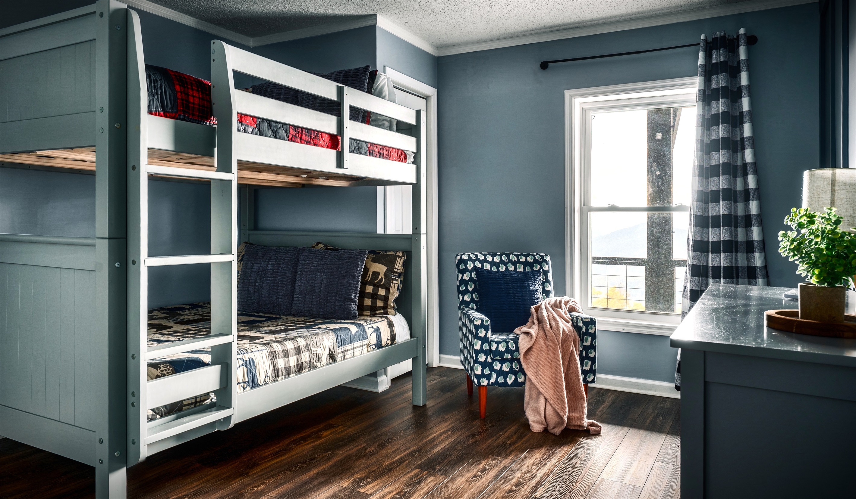 This is the secondary bedroom #2 in the basement. Furnished with a Full size bunk bed - Sleeps 2.