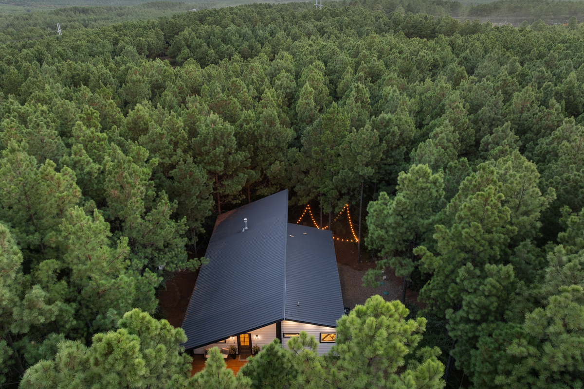From above, you can see what makes Cedar Stillness so special: a peaceful little cabin tucked deep into the pines, with nothing but forest wrapping around you.