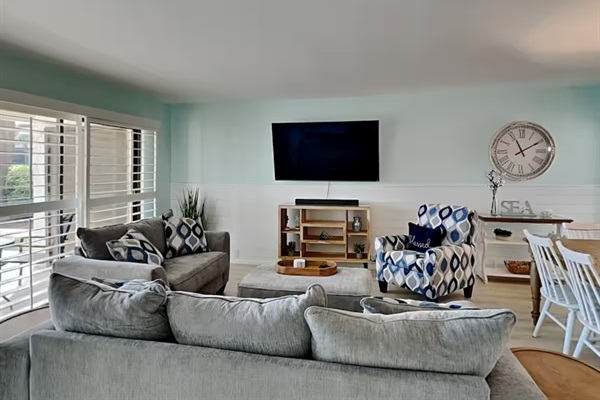 Spacious living area with smart TV