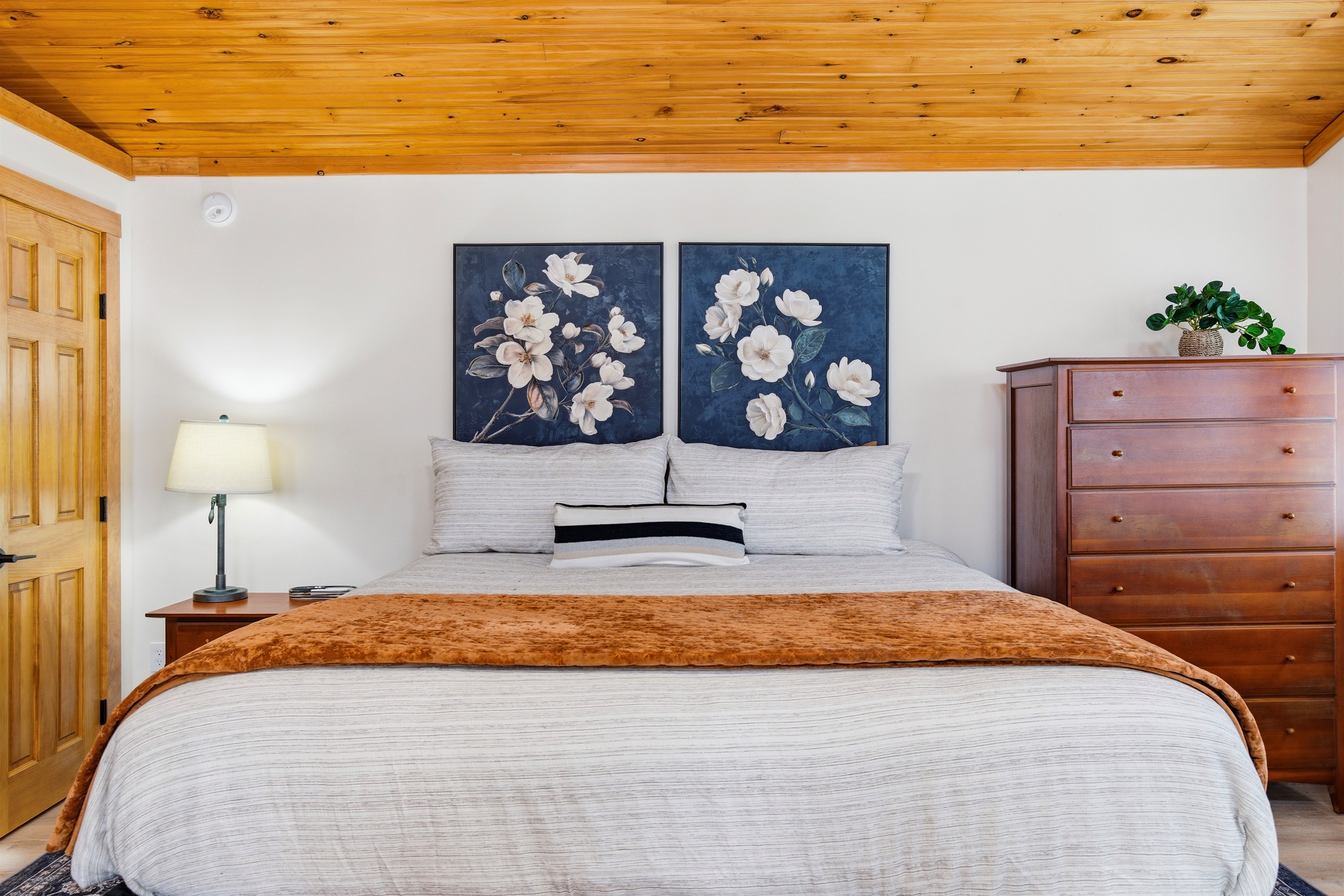 Wake up in comfort or unwind under the stars in the primary bedroom’s king bed and private porch.