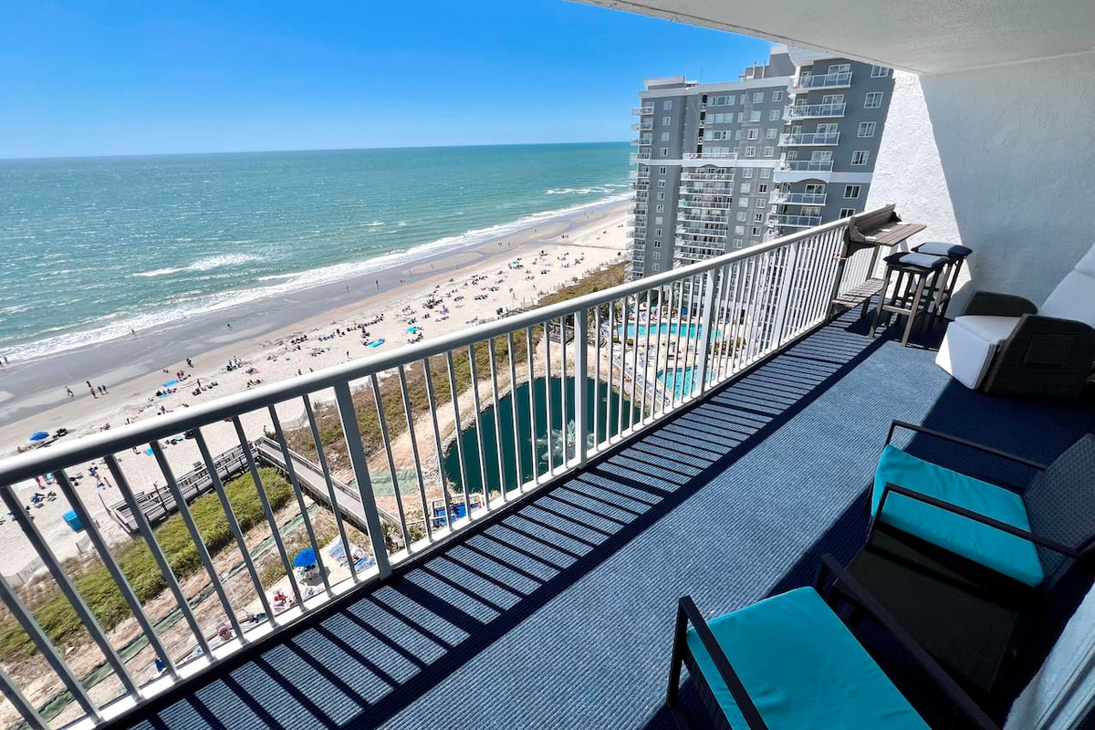 Spacious Private OceanFront Balcony with access from Living room and Master Bedroom. Outdoor chairs and bar top located on balcony as well