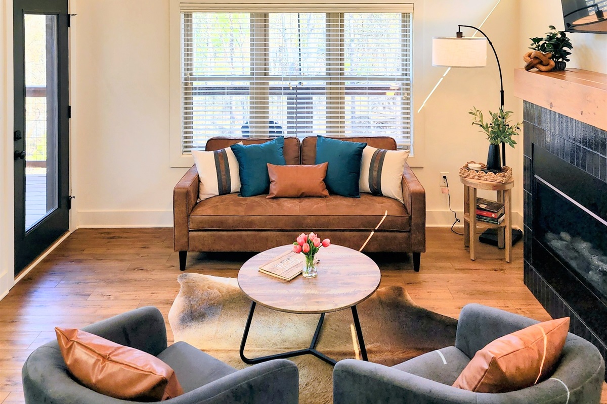 Open layout with spiral staircase and vaulted ceilings - cabin-in-the-trees vibe without feeling rustic or dated, built 2025 with all modern amenities.