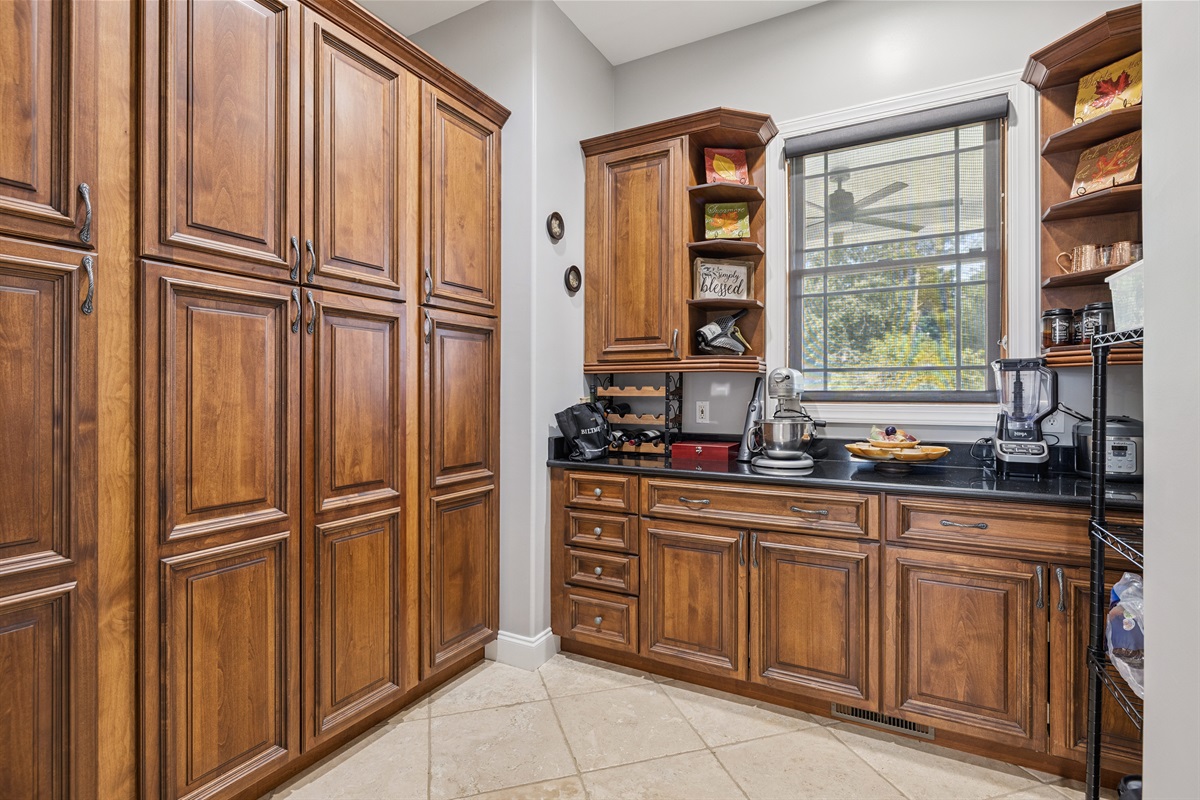 Large Butler's Pantry in the back of kitchen