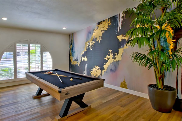 Abstract murals with gold accents